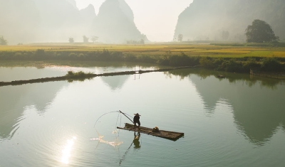 Rural Fisherman in China Landscape