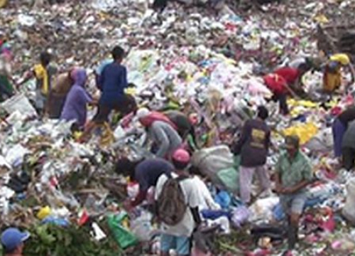 People in Garbage Dump