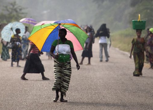 Democratic Republic of the Congo, Walikale, people walk on a street during th 2011 presidential elections.