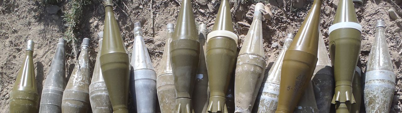 Members of an Afghan and coalition security force collected a cache of weapons during a security clearance of a known Haqqani Network foreign fighter encampment site. During the clearance over 50 insurgents were killed. Paktika province, Afghanistan, July