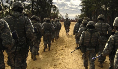 U.S. Army recruits practice patrol tactics while marching during U.S. Army basic training at Fort Jackson, S.C., Dec. 6, 2006