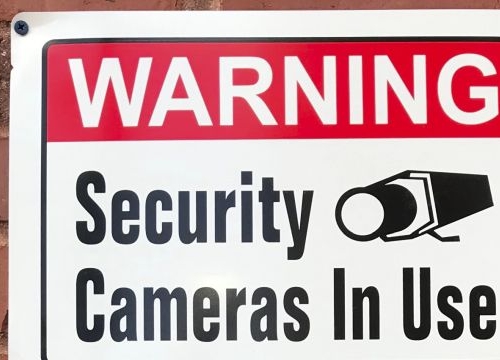 Warning sign about use of camera