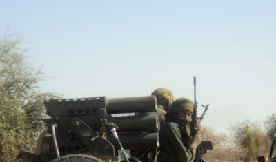 Touareg militants driving near Timbuktu, Mali