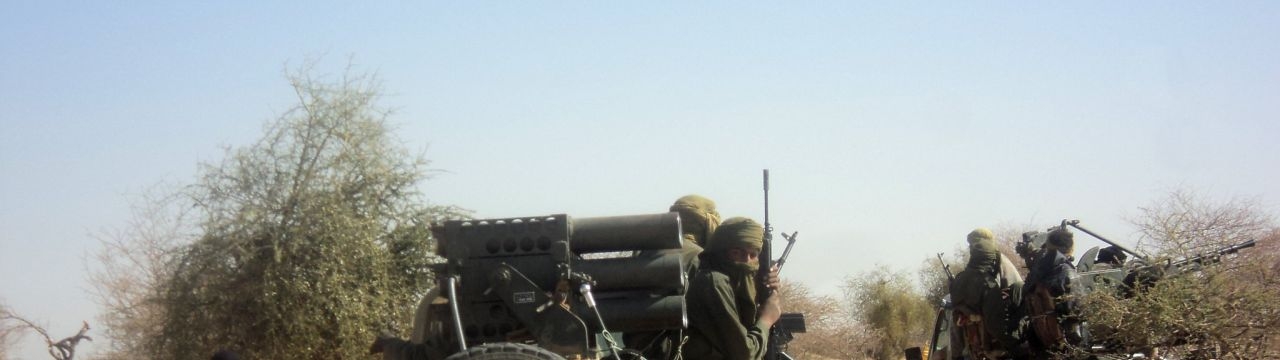 Touareg militants driving near Timbuktu, Mali