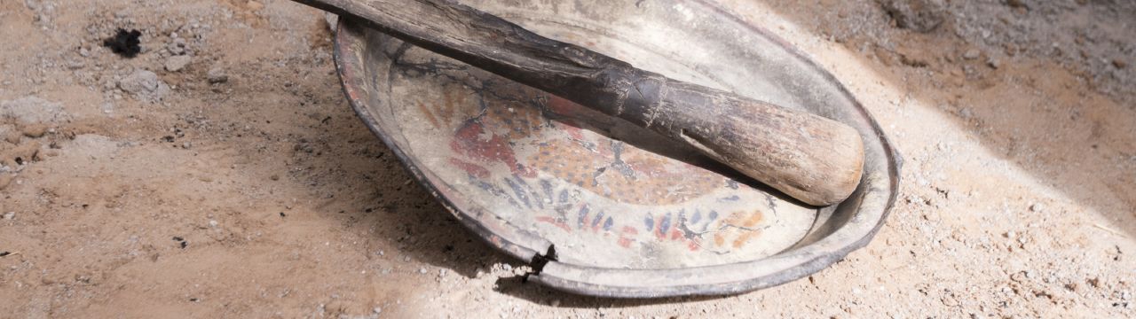 Nigeria, a broken plate on the ground: Maiduguri, Jiddari Polo area. Items brought by displaced persons to represent the things they left behind.