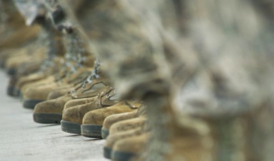 Crew chiefs from the 5th Aircraft Maintenance Squadron (US Aif Force) stand on the flight line to watch the minimum-interval takeoff at Minot Air Force Base, 15 August 2013.