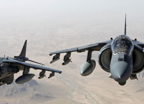 AV-8B Harrier jets with Marine Attack Squadron 311 fly over Helmand province, Afghanistan, June 10, 2013