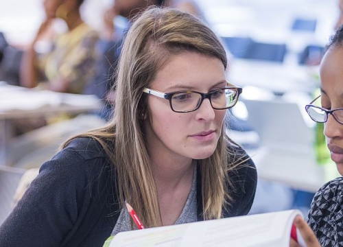 Two Geneva Academy’s students during a course