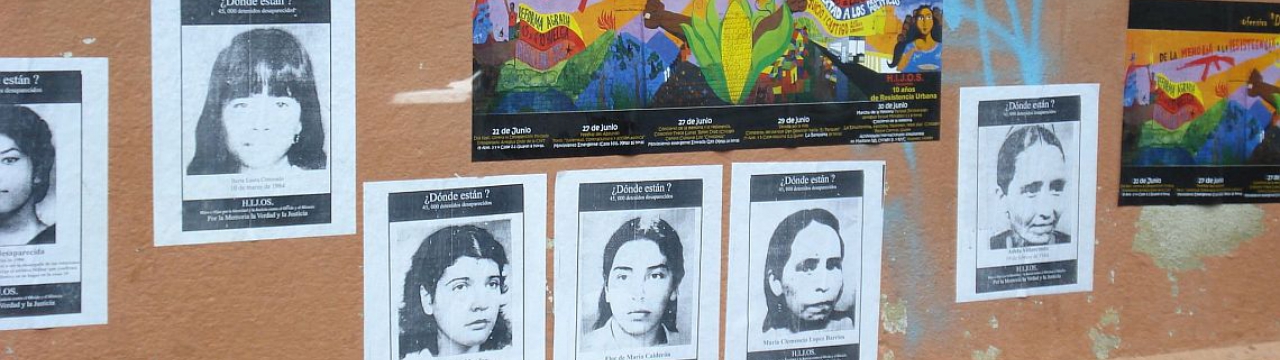 Guatemala, photos of disappeared on a wall