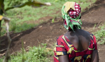 A women in a field of corn