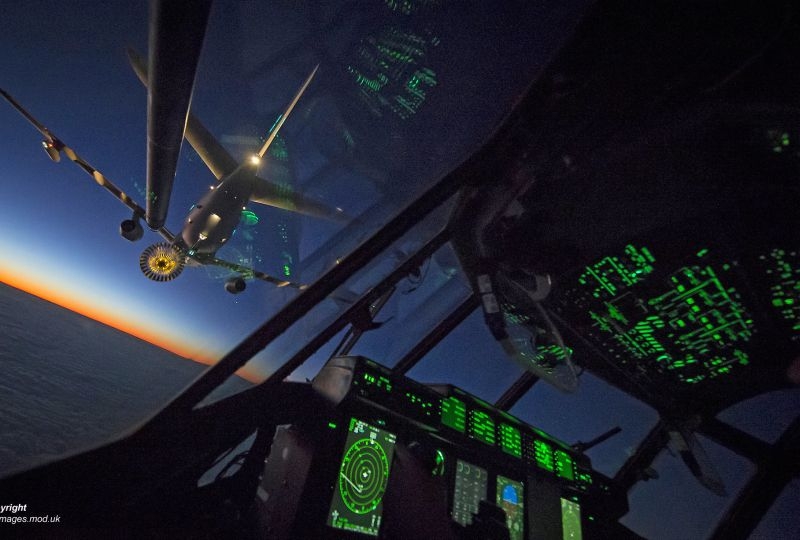 Pictured is the interior of a Royal Air Force C130J Hercules conducting low-light refuelling with an Airbus Voyager Airtanker during a routine training sortie over the West Coast of England.
