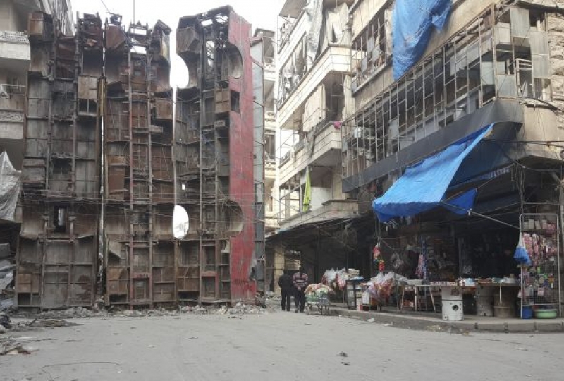 Syria, Aleppo, Bustan Al-Qaser district. Buses are used as shield to protect the neighbourhood from snipers. 