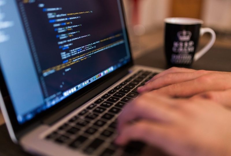 Person typing on a computer