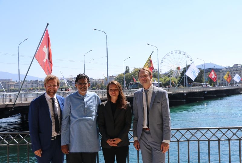 Platform's team with the Flags of the Geneva Human Rights Platform on the Mon-Blanc Bridge