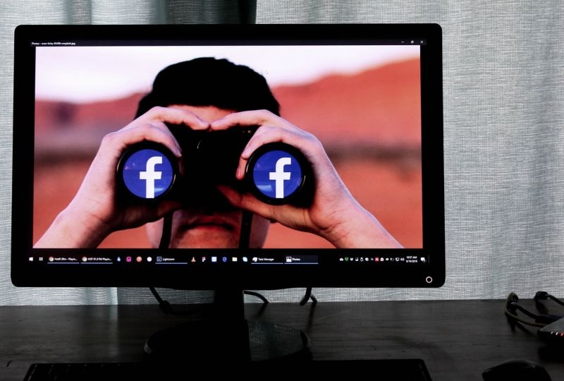 Binoculars with Facebook logo