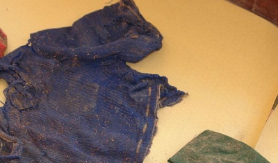 Putis, Peru. The clothes of missing child found in a mass grave close to the village at the exhibition organized for the relatives of victimes. The family will be able to identify their missing relatives.